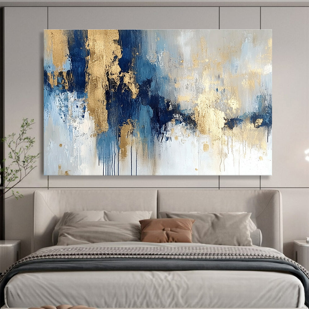 Large abstract painting in blue and gold with soft edges and texture featuring modern elegance and movement on a white background.SC021