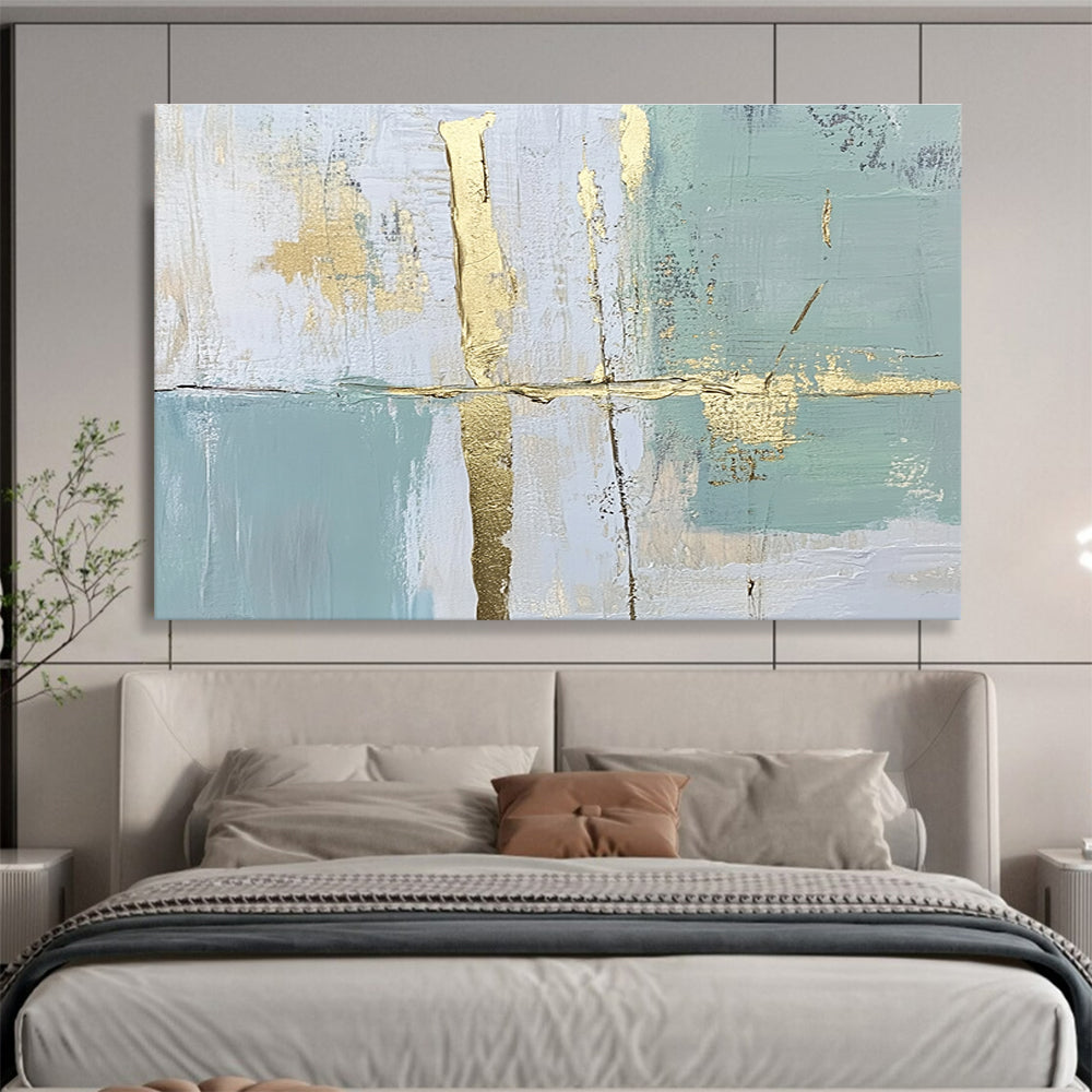 Large abstract painting with pale green and blue lines and shapes enhanced by gold foil accents for an elegant touch.SC326