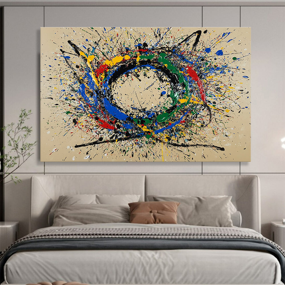 A large abstract painting featuring a circular splash pattern in blue red green yellow and black on a beige background.SC331