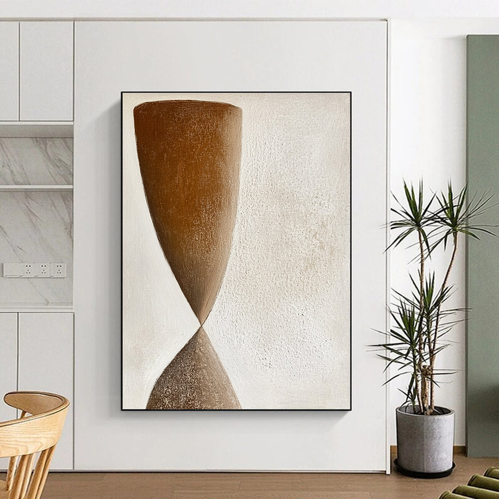Large abstract painting featuring muted earthy tones and simple hourglass shapes in a minimalist style with soft textured brushstrokes.STSC1239