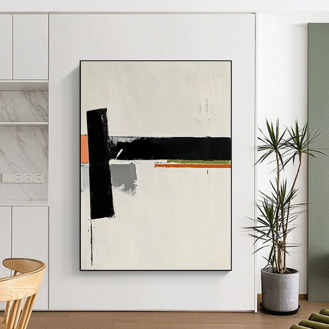 A large abstract painting features a white background with a small black rectangle and orange stripes alongside gray and green shapes embodying elegance.STSC569