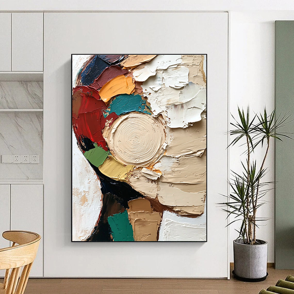 Large abstract painting featuring a textured close-up of a face in vibrant colors and dynamic brush strokes against a white circular patterned background.STSC283