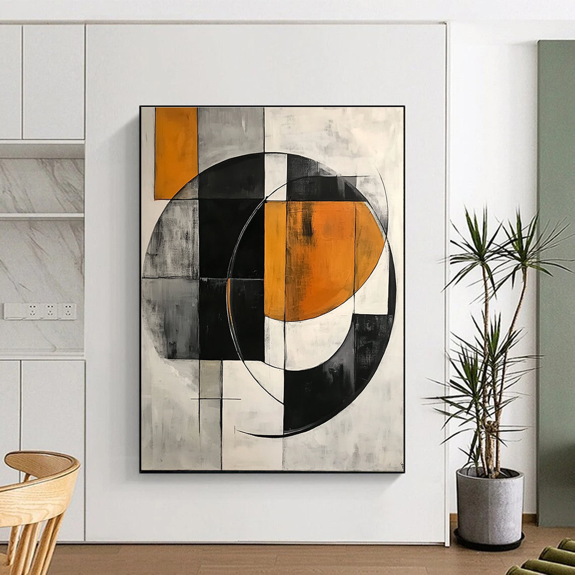 Large abstract painting featuring simple geometric shapes, circles, and half-circles in shades of gray, orange, black, and white.STSC221