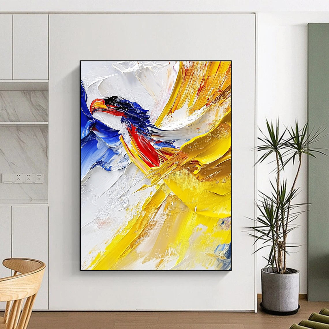 Large abstract painting with impasto technique showcasing vibrant yellow and blue hues featuring a detailed vulture against a white cloud background.STSC426