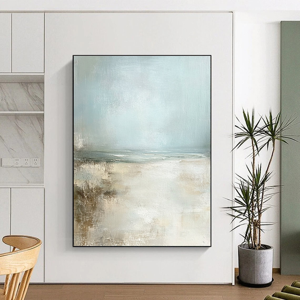 Large abstract painting featuring a serene pale blue sky and sandy beach in neutral colors for a calming ambiance.STSC095