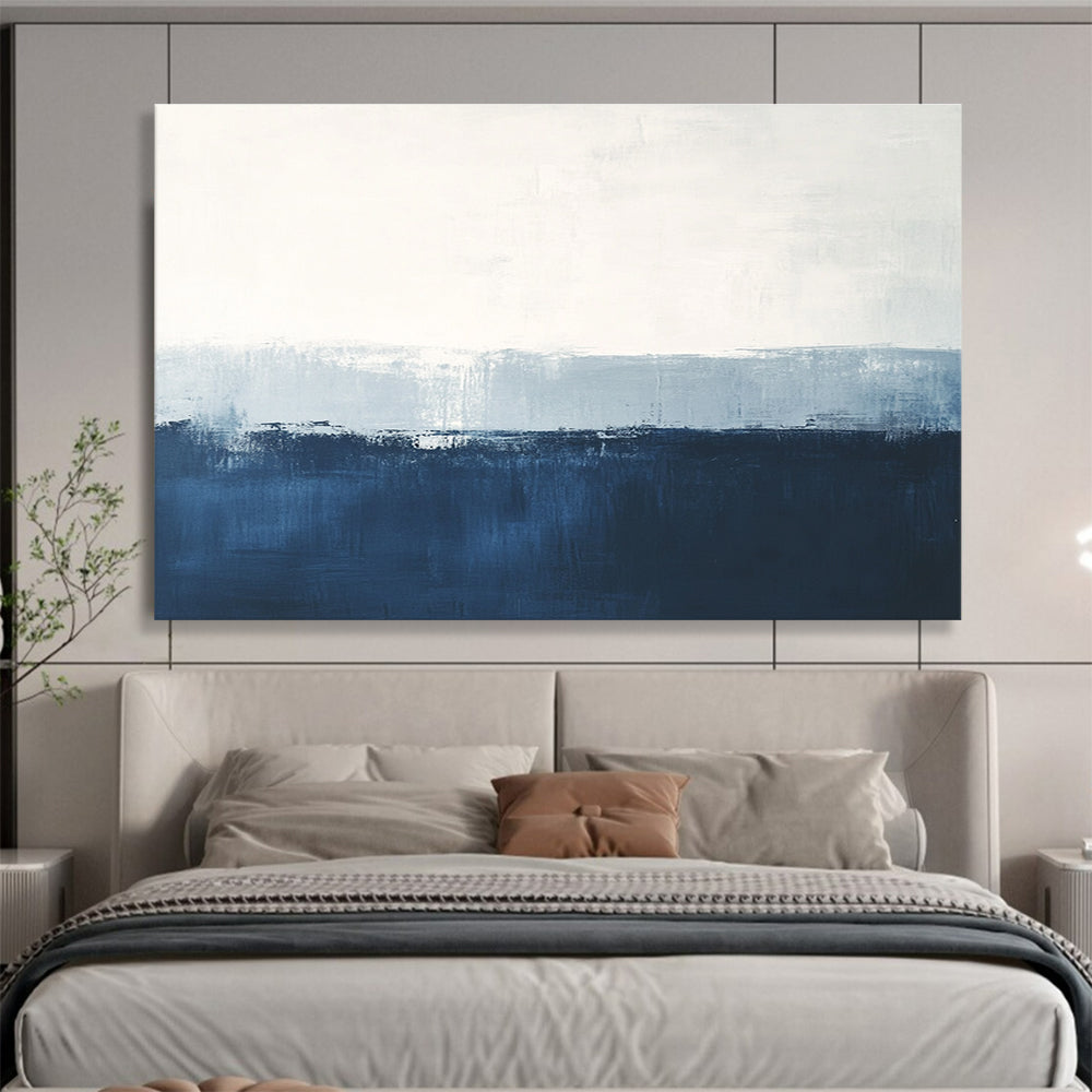 Large abstract painting in calming blue and white with subtle textures tranquil sea view soft edges and atmospheric skies.SC027