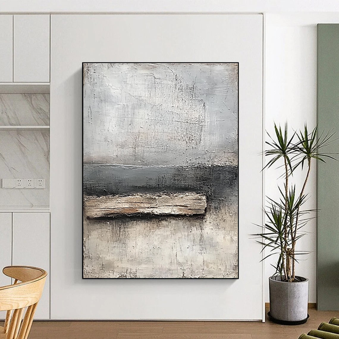 Abstract painting featuring neutral tones of gray and white with textured canvas and thick paint highlighting a small piece of old wood by the water's edge.STSC138