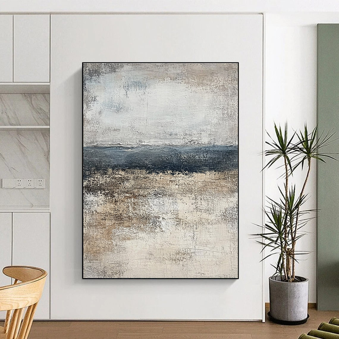 Large abstract painting of the ocean in muted gray and beige tones, featuring a calming neutral color palette that enhances any space.STSC491