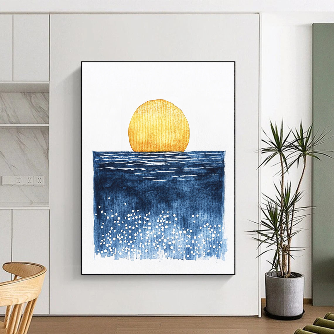 Large abstract watercolor painting of a sun rising over the ocean in minimalist style featuring blue yellow and white dots.STSC506