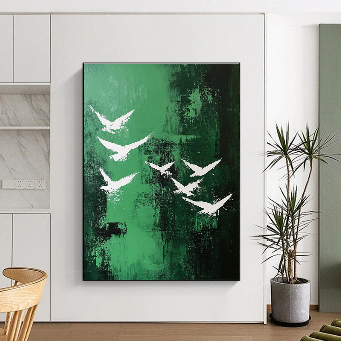 Abstract painting featuring white birds soaring over a vibrant emerald green landscape in a minimalistic style.STSC362