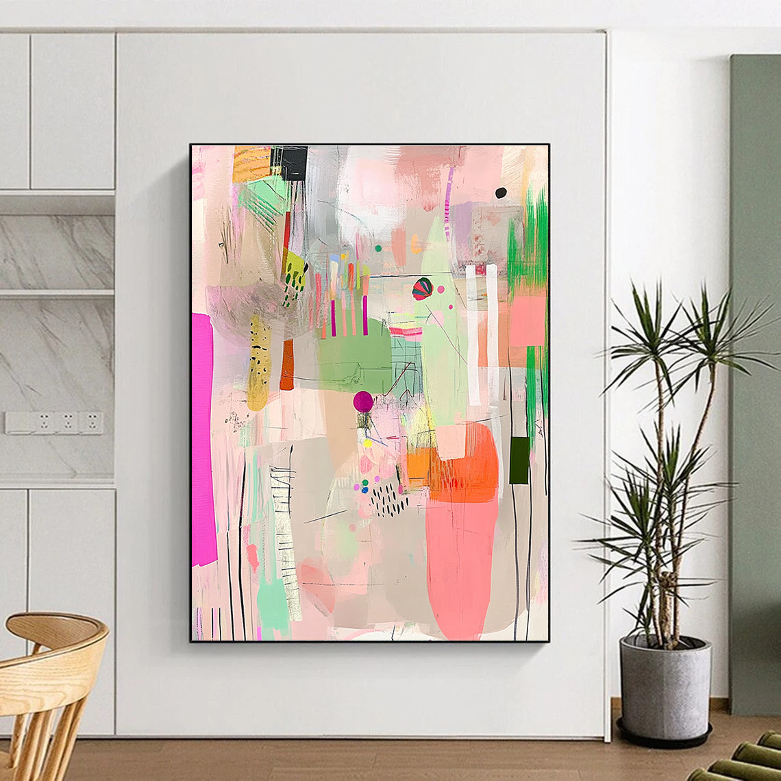 Large abstract artwork features vibrant pinks greens and yellows with playful textures patterns and a joyful sense of movement against a soft white background.STSC573