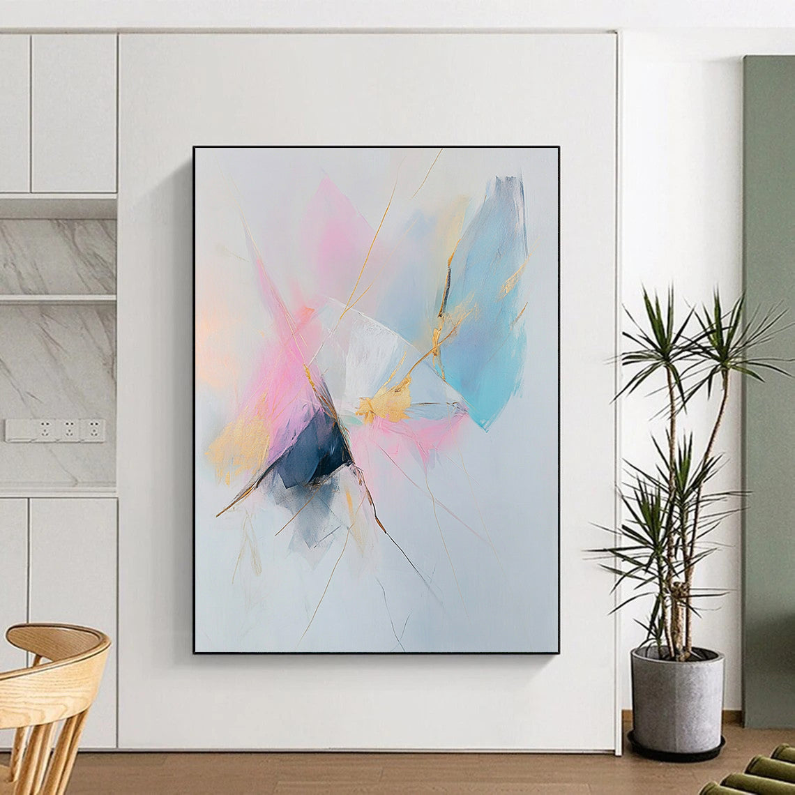 Large abstract painting featuring pastel pink and blue tones with gold accents on a white background creating a serene and calming atmosphere.STSC783