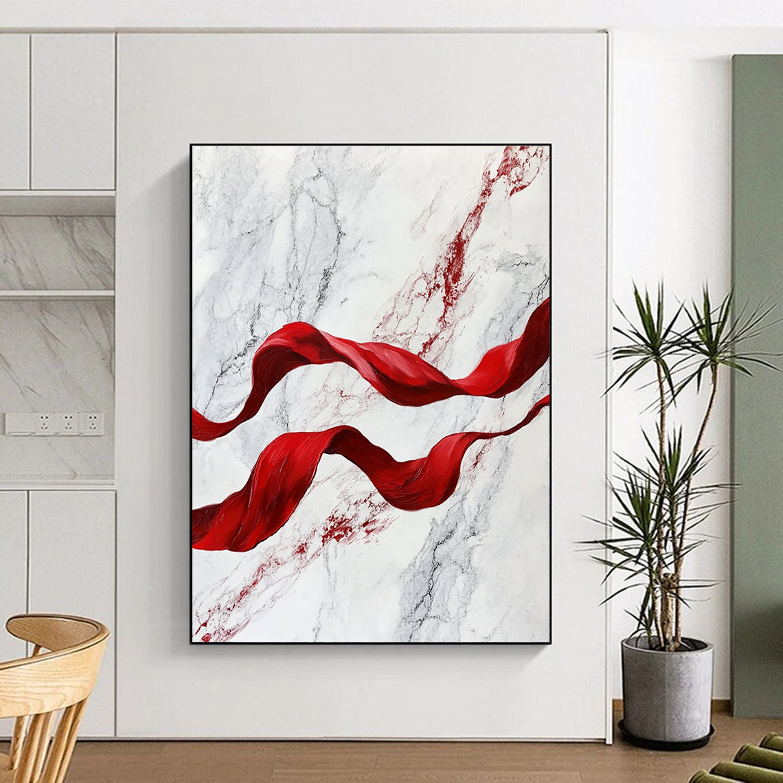 A large abstract painting featuring red flowing ribbons on white marble, evoking movement and elegance in a captivating blend of color and texture.STSC1416