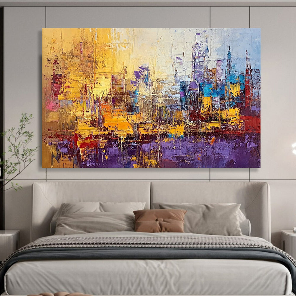 Large abstract painting of a vibrant cityscape in textured gold blue purple and red with impasto strokes and palette knife techniques.SC355