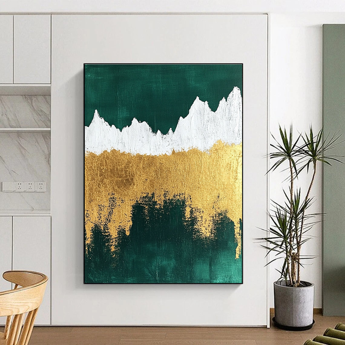 Abstract painting featuring metallic gold foil texture with emerald green background and white mountain silhouette for a striking visual impact.STSC067