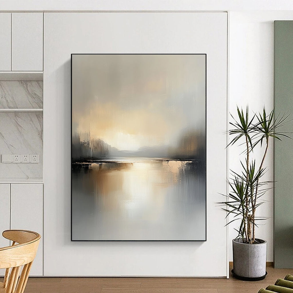 Large abstract landscape painting featuring a serene lake and soft gray beige tones capturing the tranquility of golden hour reflections.STSC084