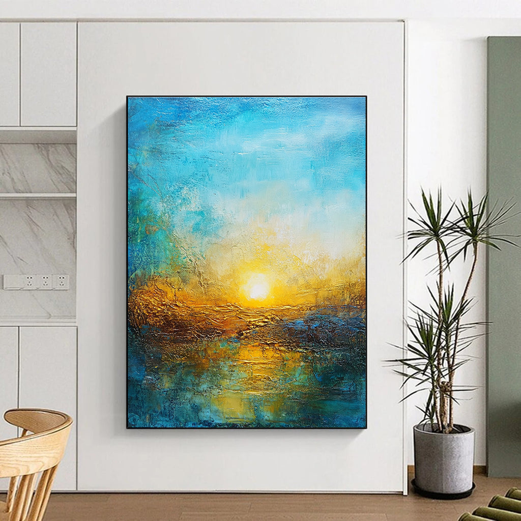 Large abstract painting featuring a vibrant sunset in golden hues and deep blues over a textured landscape symbolizing new beginnings and hope.STSC200