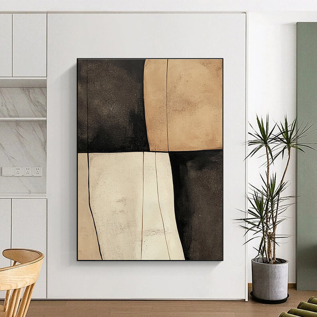 Large abstract painting featuring beige black and white shapes with smooth tan textures on a dark gray background.STSC627