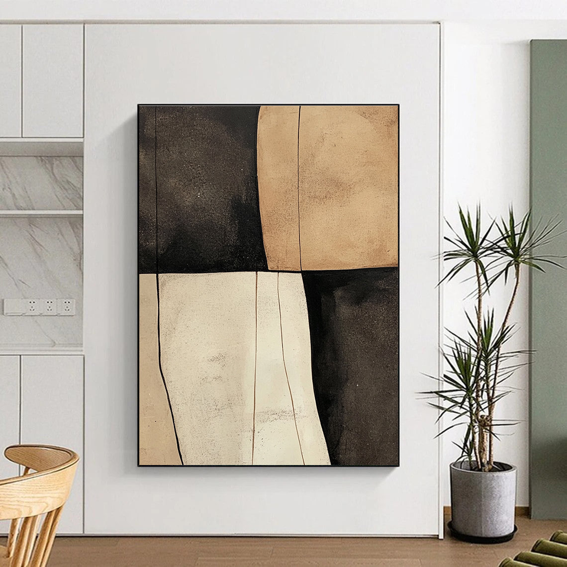 Large abstract painting featuring beige black and white shapes with smooth tan textures on a dark gray background.STSC627