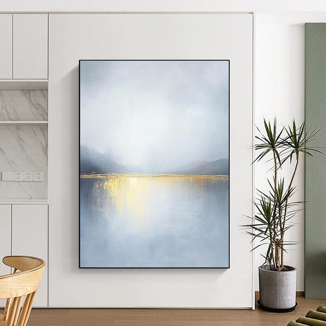 Large abstract painting of an overcast sky with golden water reflections soft tones and serene landscape capturing a tranquil mood.STSC271