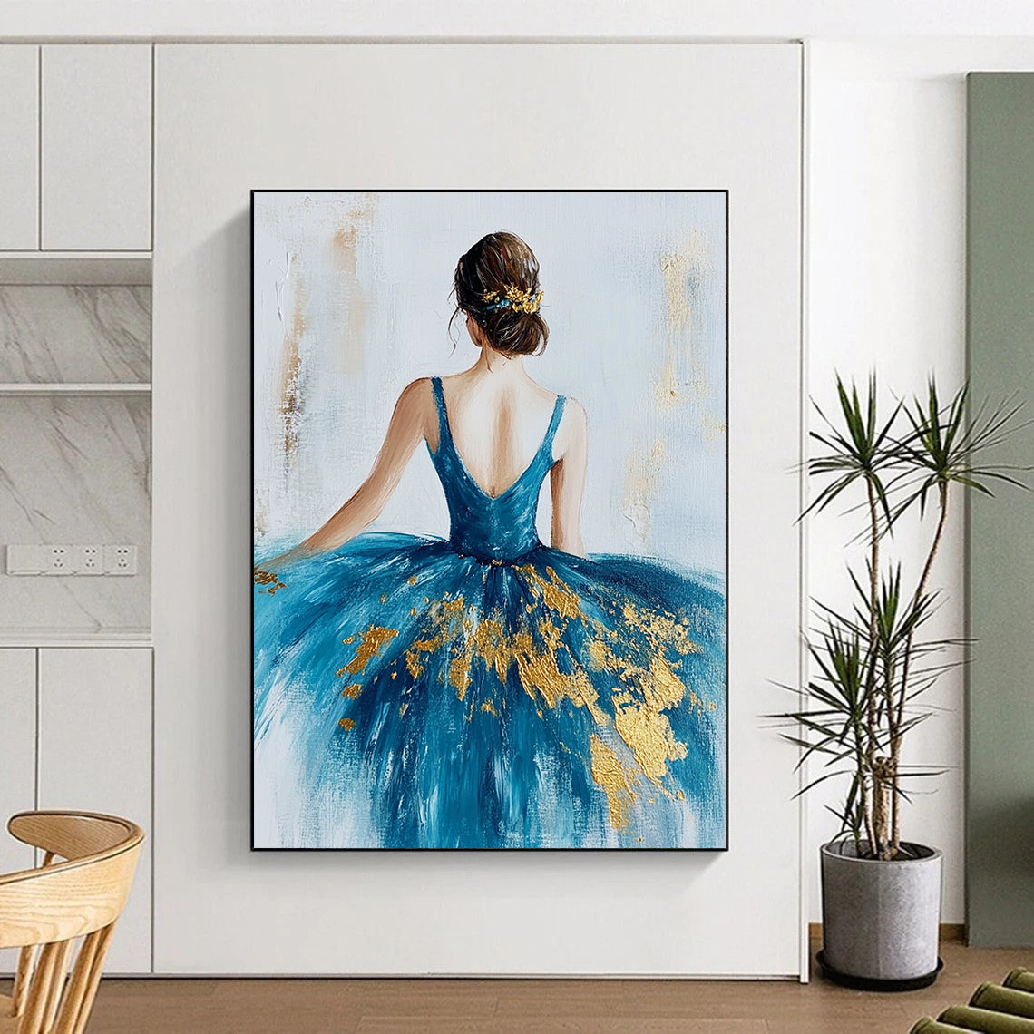 Large abstract painting of a ballerina in a blue dress with gold leaf on a textured white canvas background.STSC155