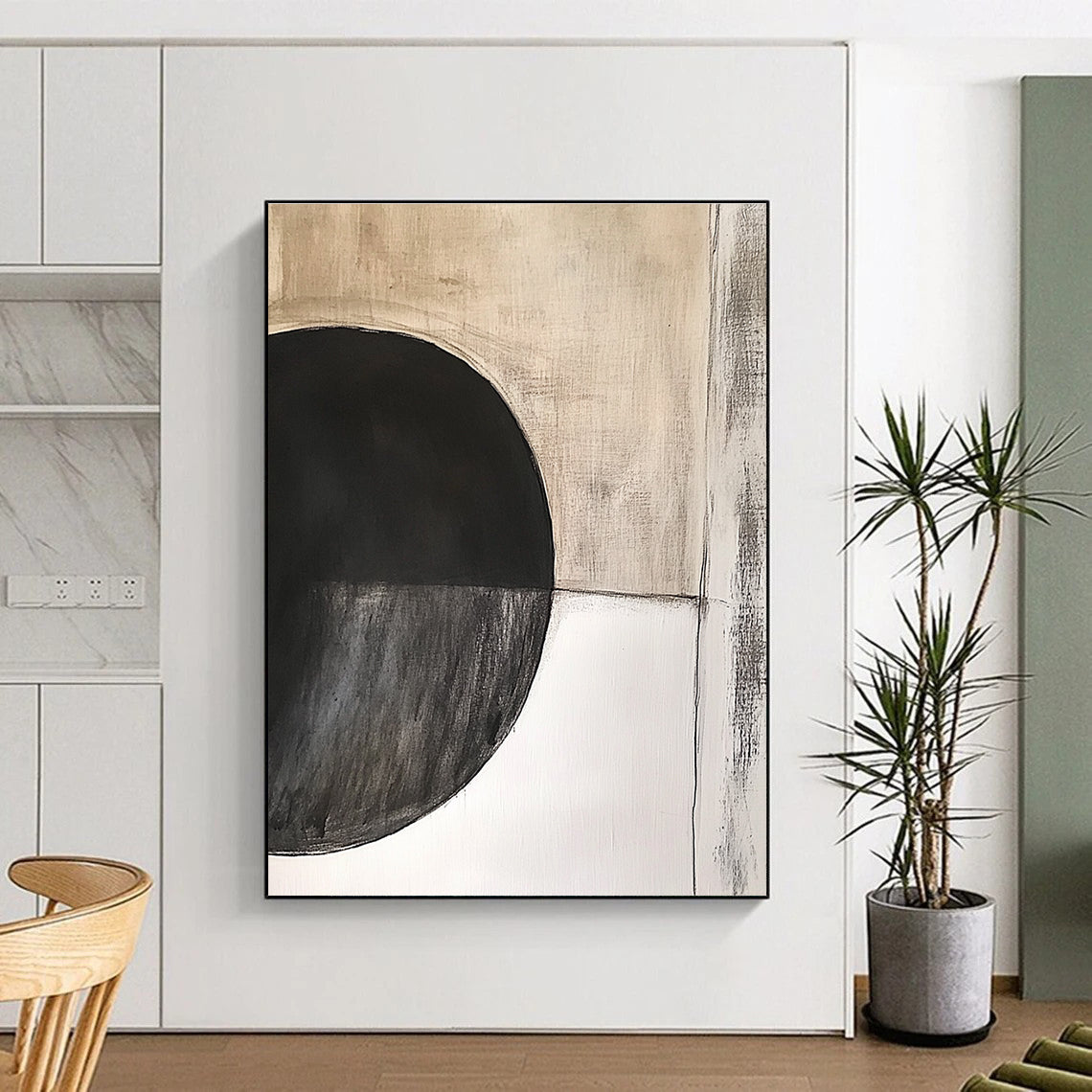 Large abstract painting featuring an oval black circle with dark grey texture on beige textured background by Peter Cresely.STSC664