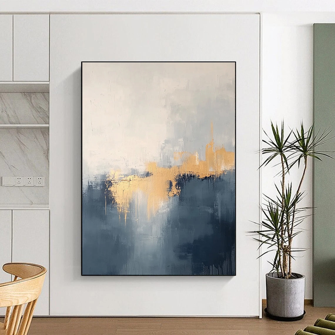 Large abstract painting in grey and blue tones with gold accents creating a dreamy misty atmosphere.STSC731