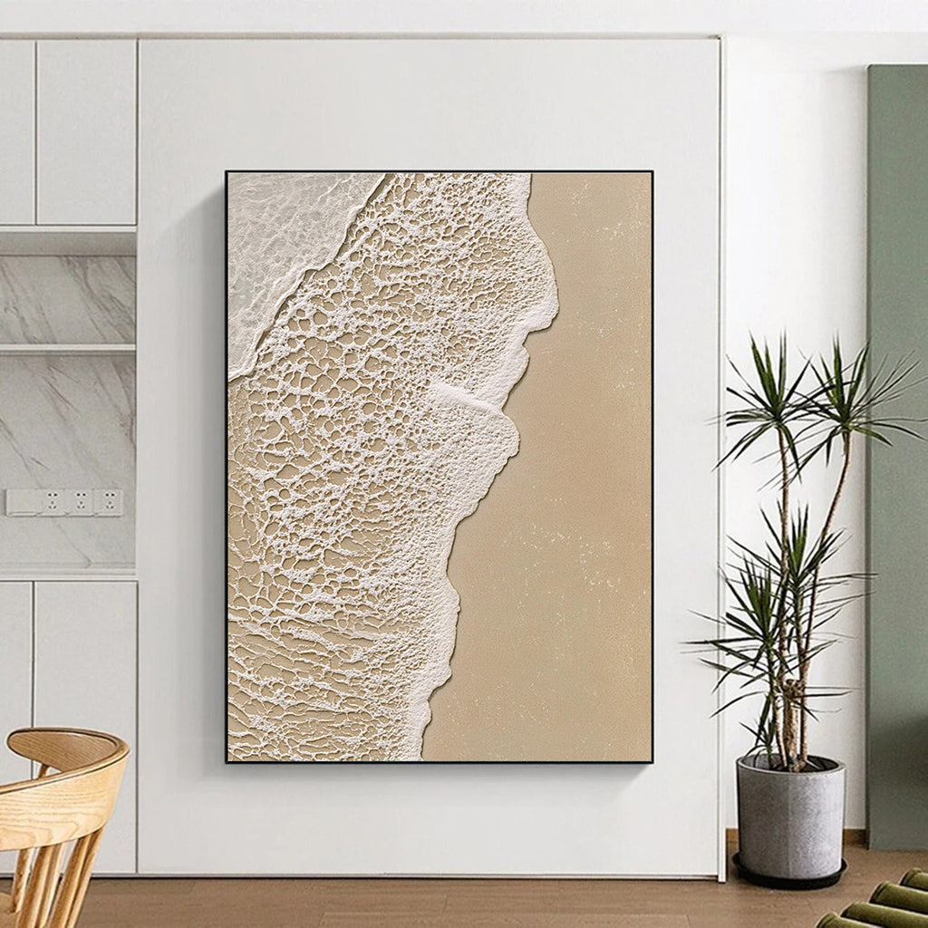 Abstract painting of a serene beach scene highlighting intricate textures of sand and water in soothing beige and white tones.STSC953