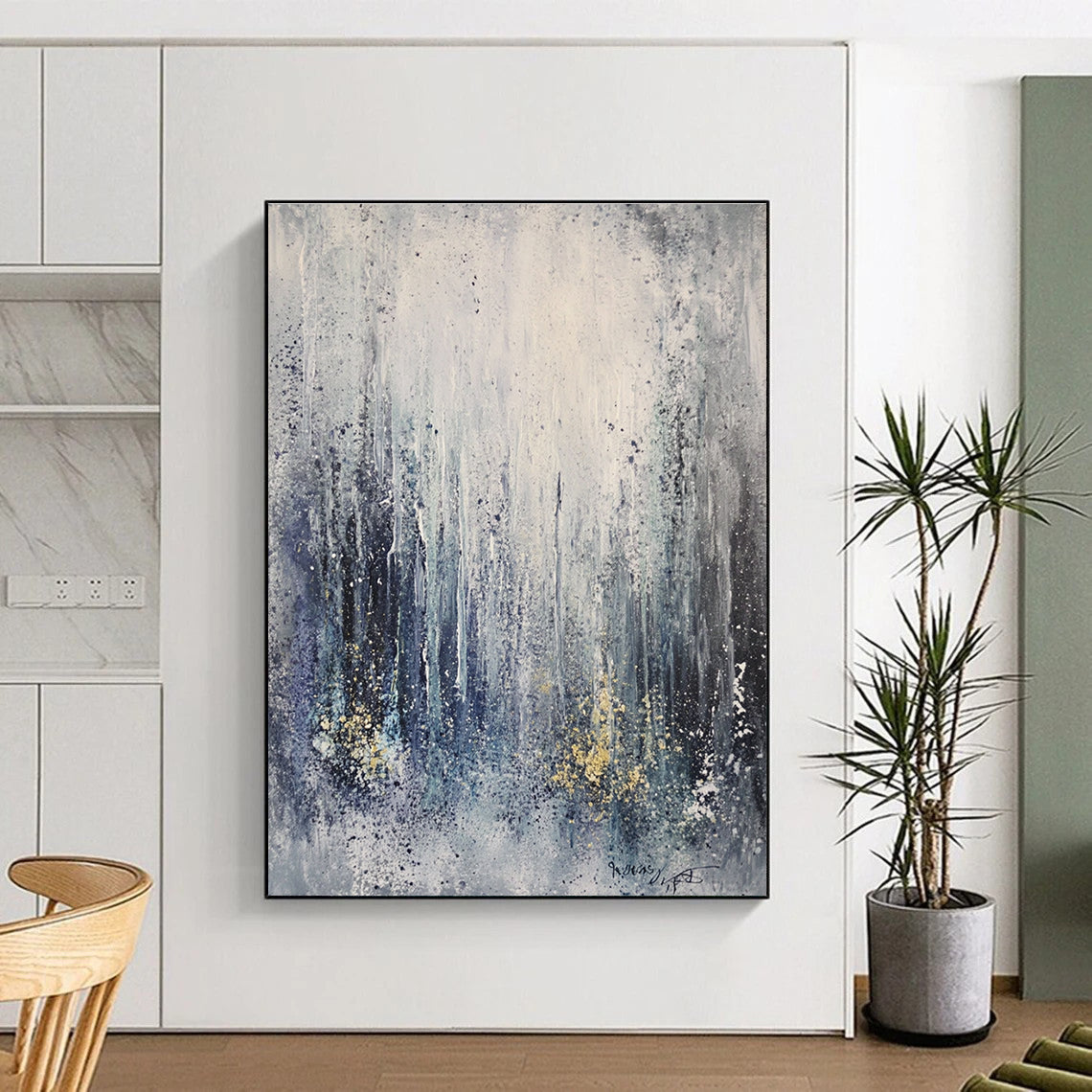 Large abstract painting capturing an ice storm featuring frozen waterfalls and icicles in gray tones with splashes of gold and blue.STSC607