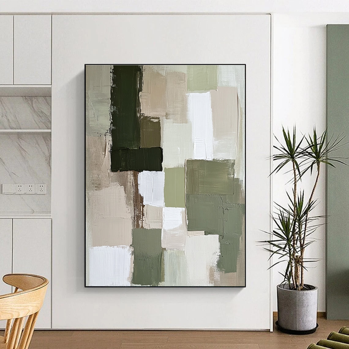Large abstract painting featuring soft neutral tones like sage green and beige with dynamic textures and shapes that create a calm atmosphere.STSC767