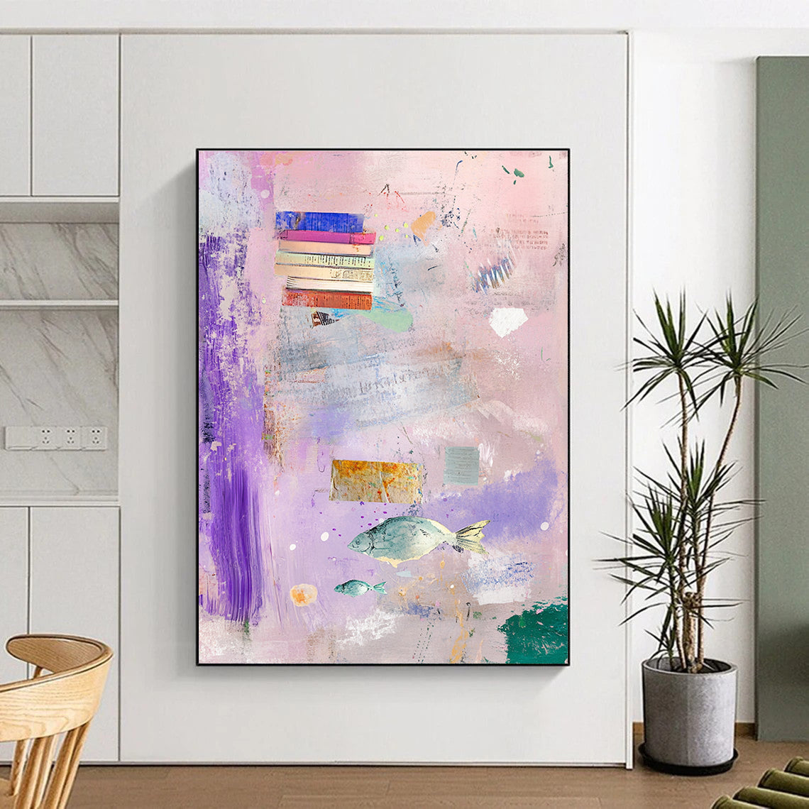 Abstract painting featuring a light pink background with pastel colors, books, feathers, and flying fish in hues of purple, blue, green, and yellow.STSC1041