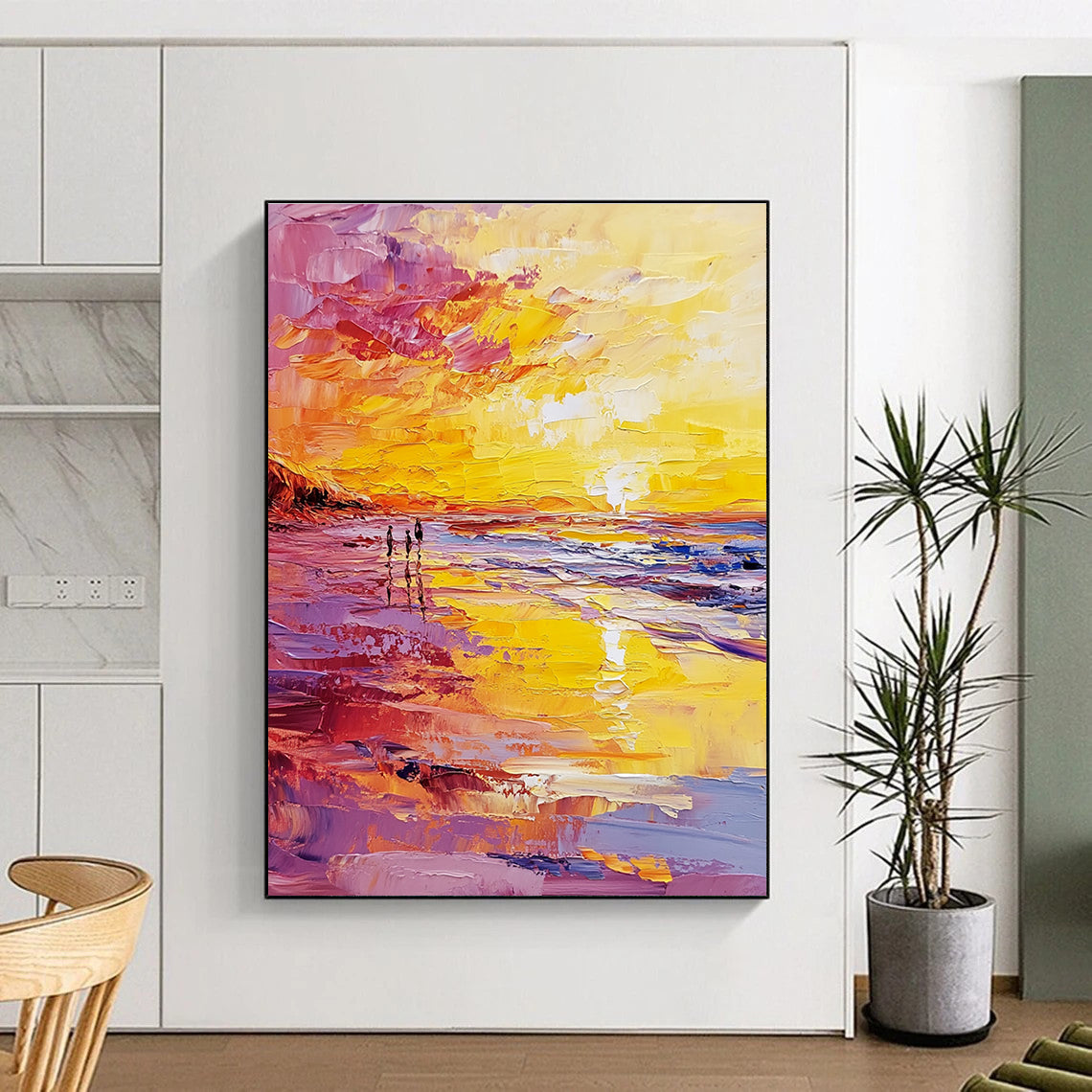 Abstract oil painting of a beach at sunset featuring a vibrant yellow and pink color scheme with small figures walking along the shore.STSC157
