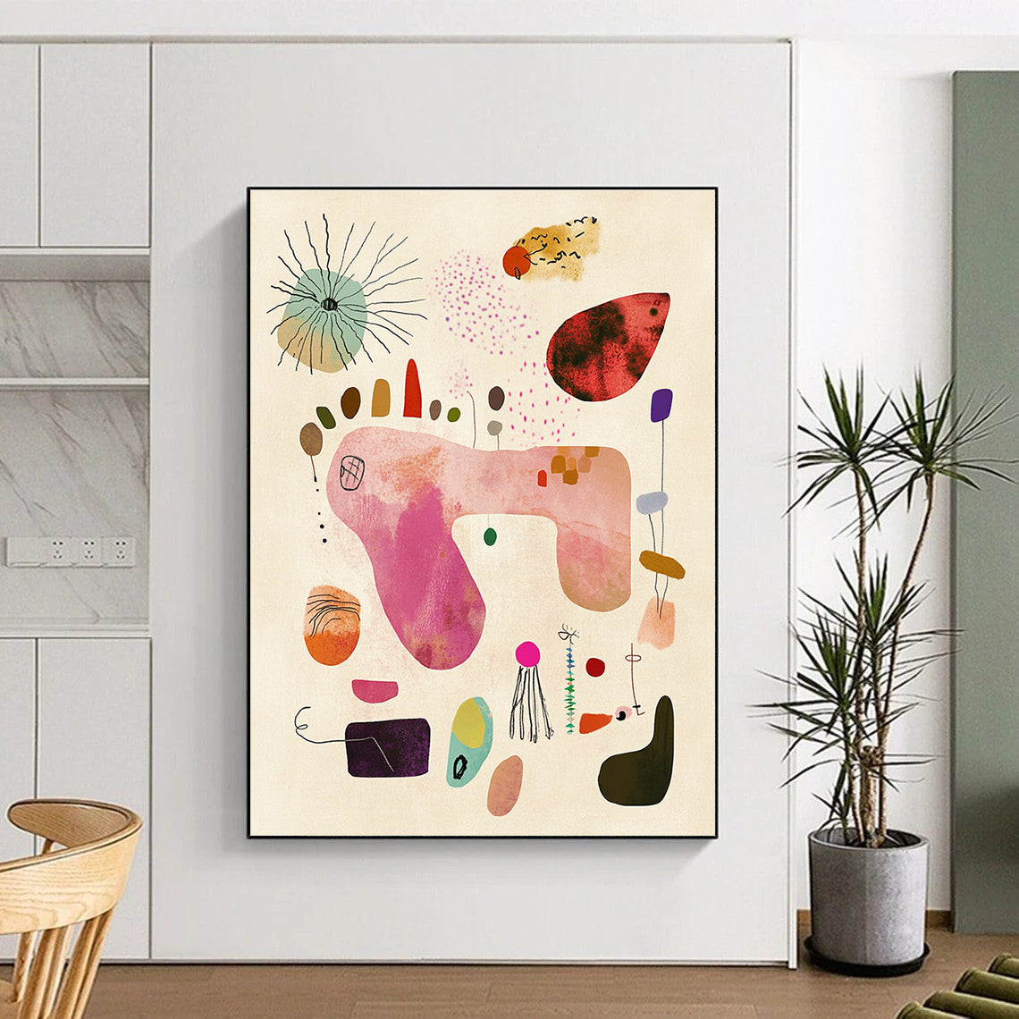 A large abstract painting featuring whimsical shapes and textures in soft pastel colors evoking joy and a carefree spirit on light beige paper.STSC1236