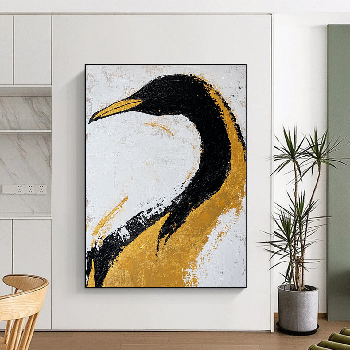 Large abstract art painting featuring a black and gold penguin on textured paper with gold leaf accents against a white background.STSC011