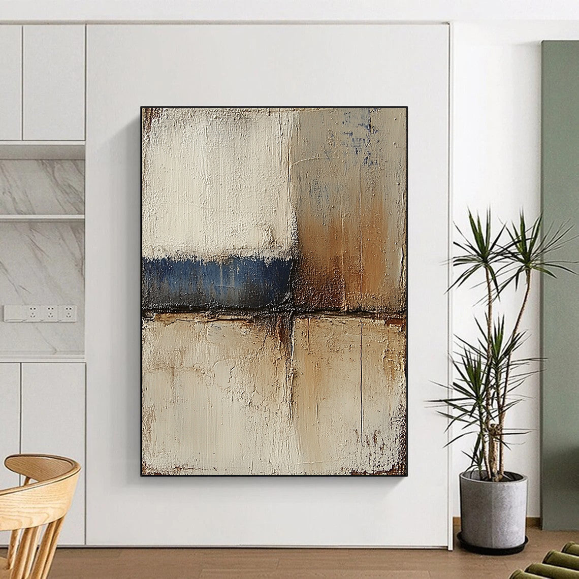Abstract landscape with neutral colors in earth tones of beige and brown accented by blue textured paint ideal for modern decor.STSC079