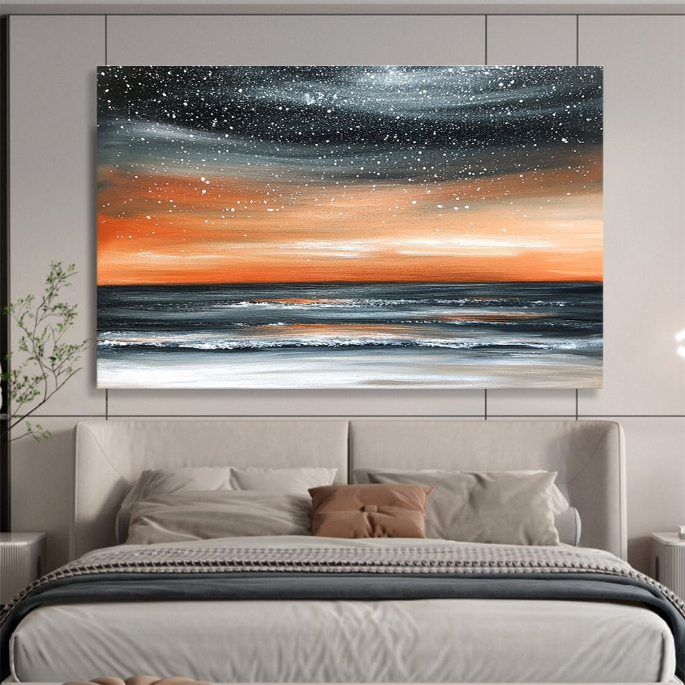 Large abstract painting of the ocean at night featuring an orange gray sky and starry snowfall over a muted water surface.SC130