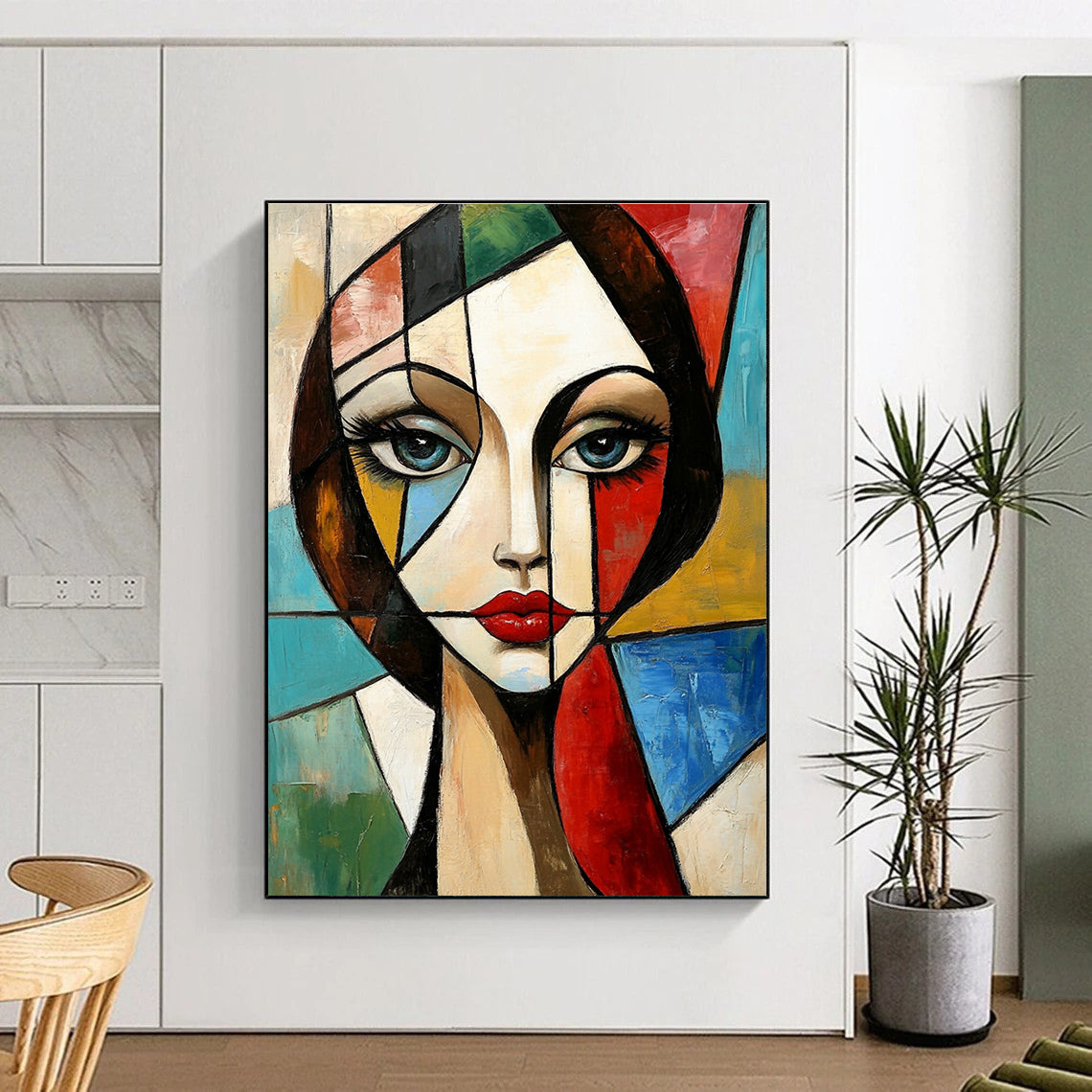 Large abstract painting in Cubism style features a geometric portrait of a woman with vibrant colors and dynamic patterns in the background.STSC1376