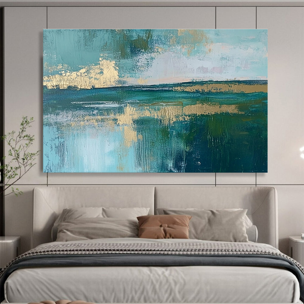 Large abstract painting featuring a serene lake, vibrant green fields, light blue sky, and elegant gold foil accents.SC115